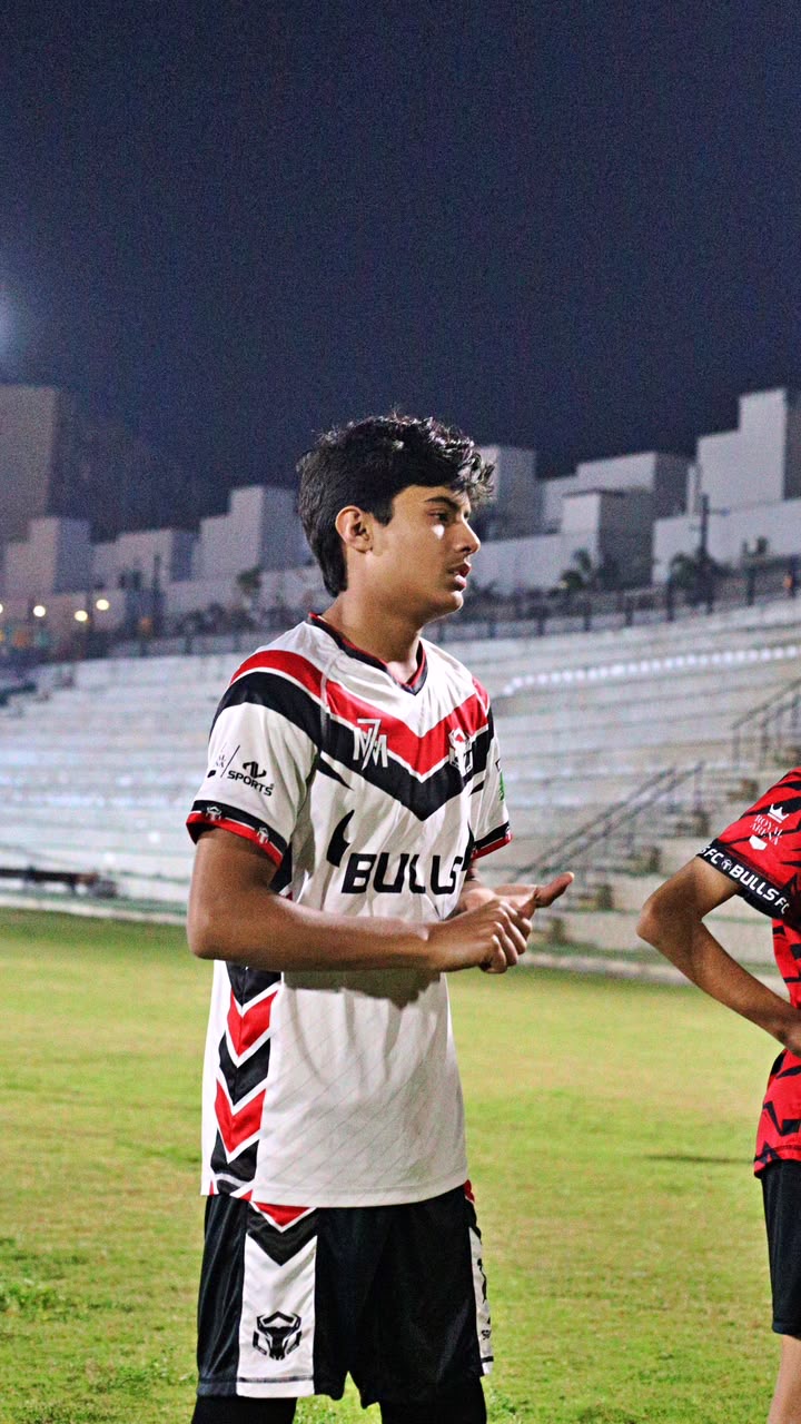 Portrait of Zavyan Haider in a white training kit
